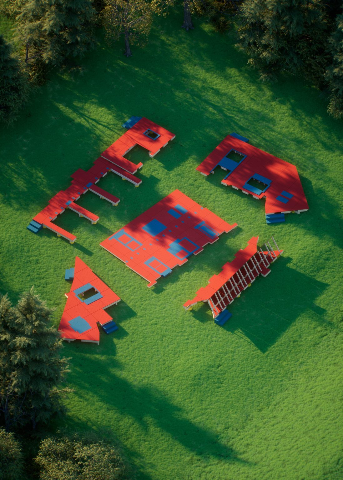 Gallery 4 - From above 5 bright platforms composed of parts of a house facade are arranged on a green lawn.