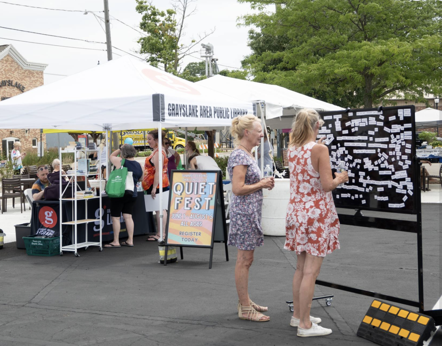 Gallery 1 - women making word sentences, people buying books