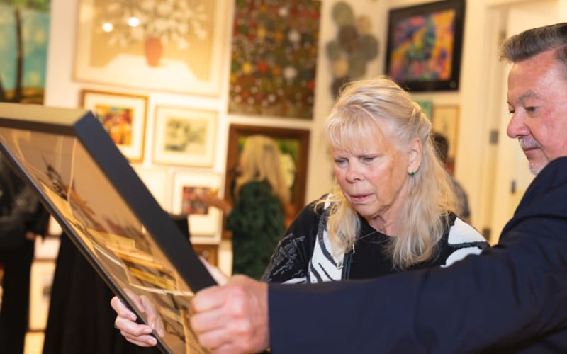 Gallery 1 - People looking at artwork together